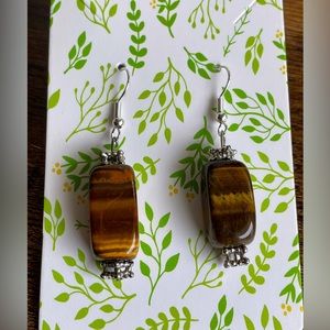 Natural tiger’s eye earrings with hypoallergenic stainless steel hook.